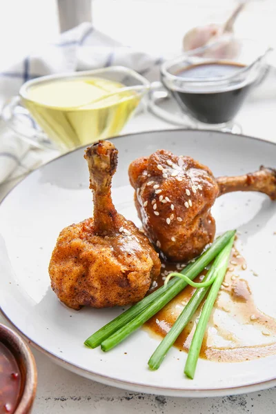 Plate Tasty Chicken Lollipops Light Background — Stock Photo, Image