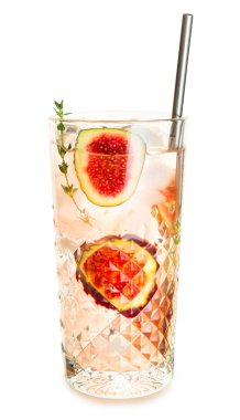 Glass of tasty fig lemonade on white background