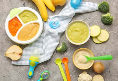 Composition with healthy baby food on dark background