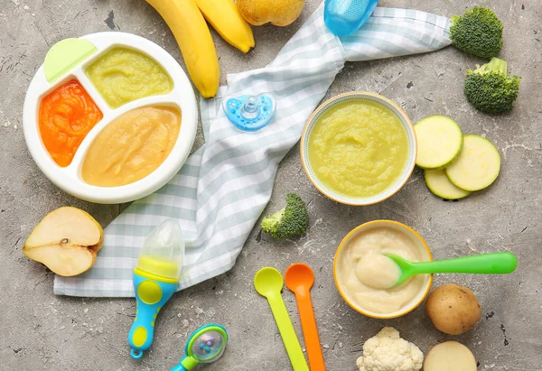 Composition with healthy baby food on dark background