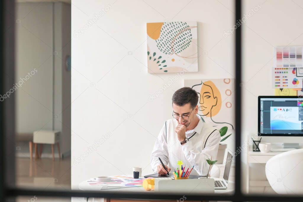 Graphic designer working in office