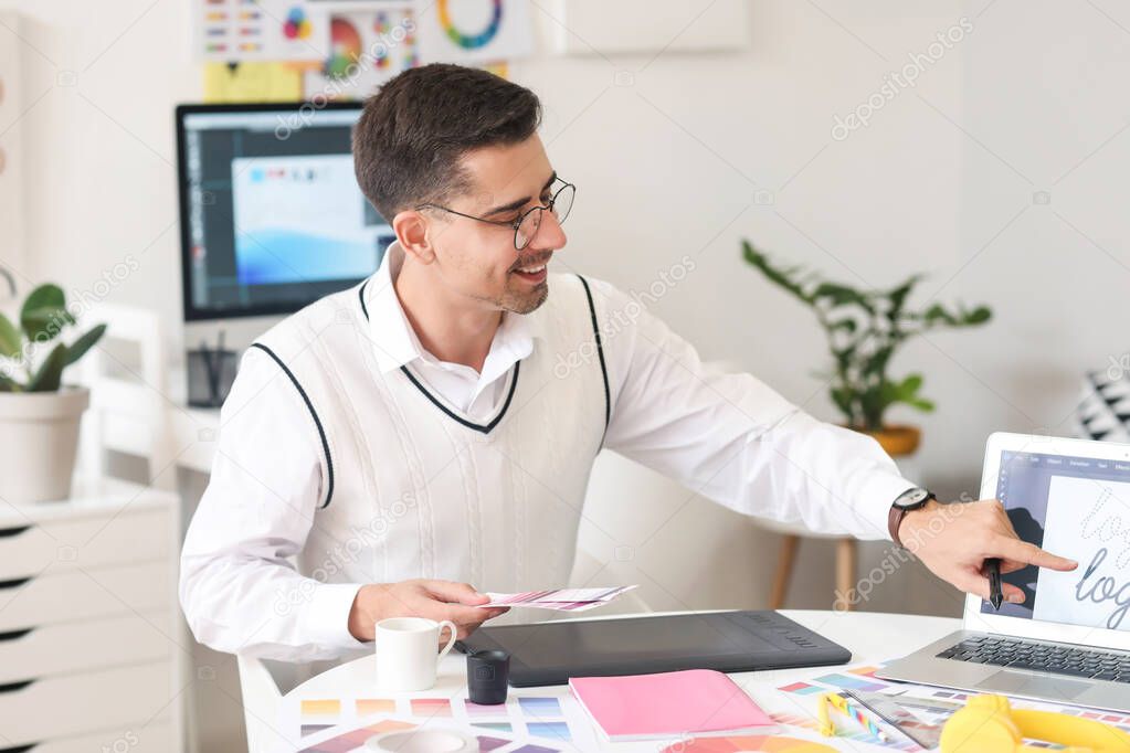 Graphic designer working in office