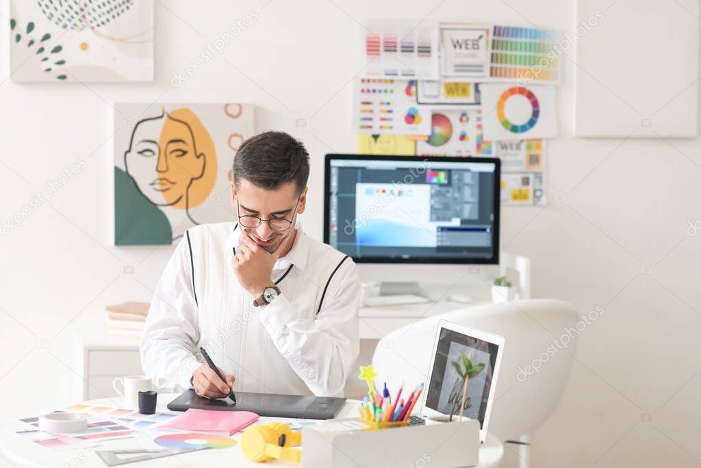 Graphic designer working in office