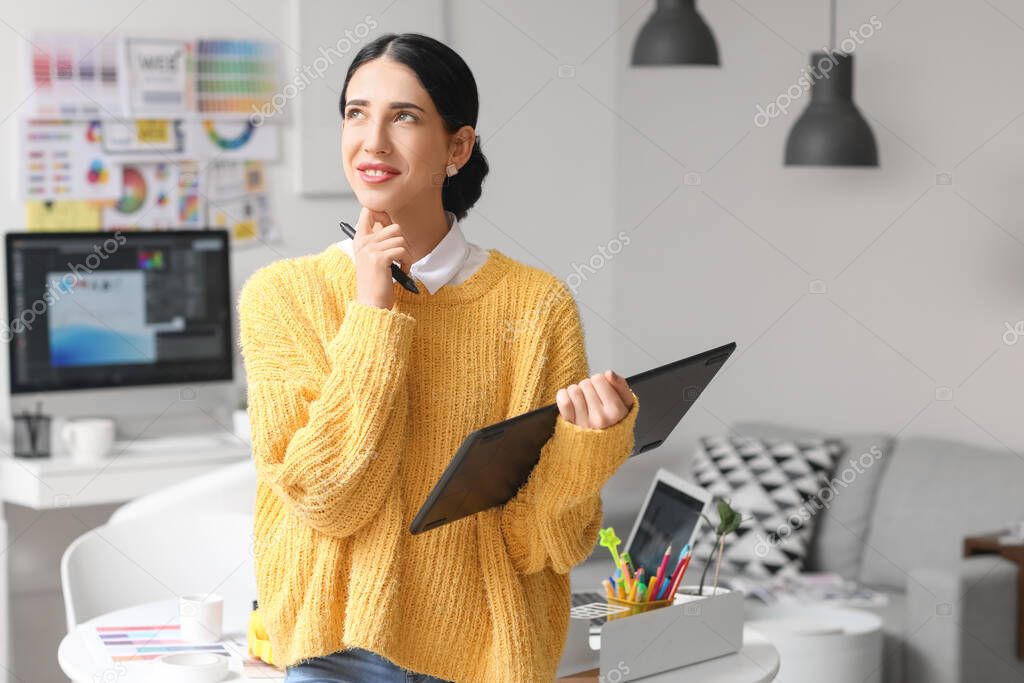 Graphic designer working in office