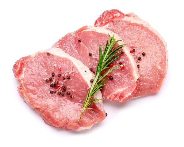 Fresh raw meat with spices on white background