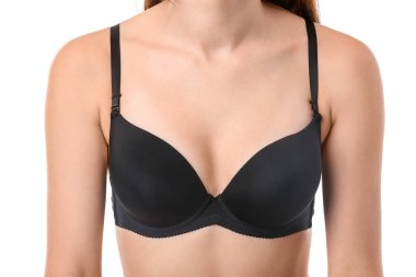 Beyaz arka planda sütyenli genç bayan, yakın plan.