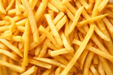 Arka plan olarak bir yığın lezzetli patates kızartması.
