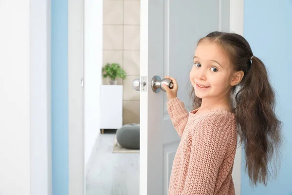 Cute Little Girl Opening Door Room — Stock Photo, Image