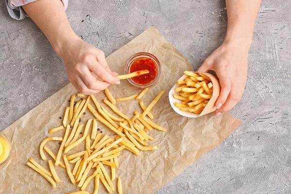 Woman Eating Tasty French Fries Tomato Sauce Top View — Stock Photo, Image