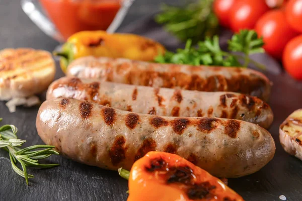 Slate Plate Delicious Grilled Sausages Dark Background Closeup — Stock Photo, Image