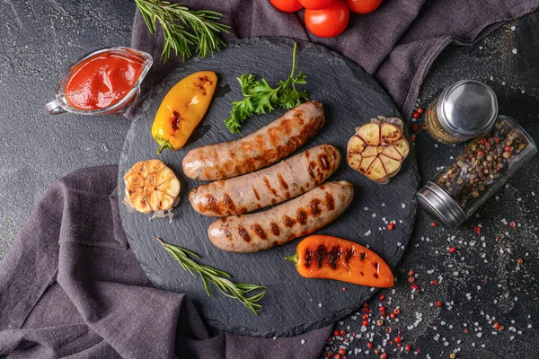 Slate Plate Delicious Grilled Sausages Dark Background — Stock Photo, Image