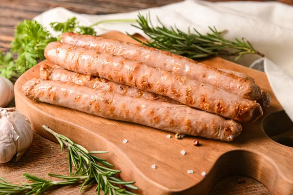 Board Delicious Grilled Sausages Wooden Background — Stock Photo, Image