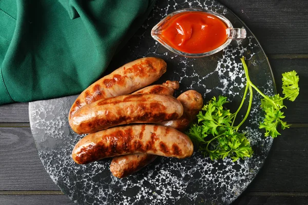 Delicious Grilled Sausages Dark Wooden Background — Stock Photo, Image