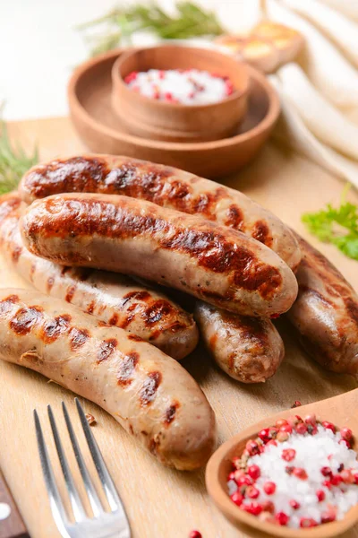 Board Delicious Grilled Sausages Light Background Closeup — Stock Photo, Image