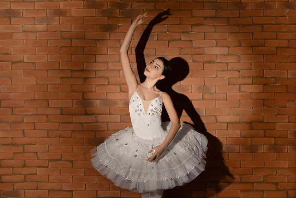 Beautiful Young Ballerina Brick Background — Stock Photo, Image