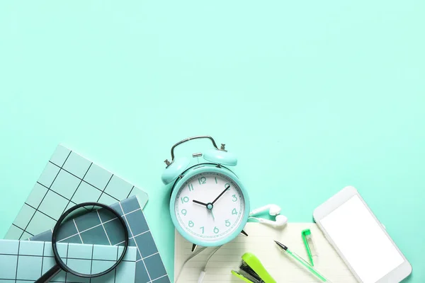 Composition Alarm Clock Earphones Stationery Color Background — Stock Photo, Image