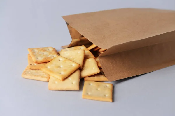 Paper Bag Crackers Grey Background — Stock Photo, Image