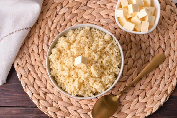 Bowls Tasty Couscous Butter Wooden Background — Stock Photo, Image