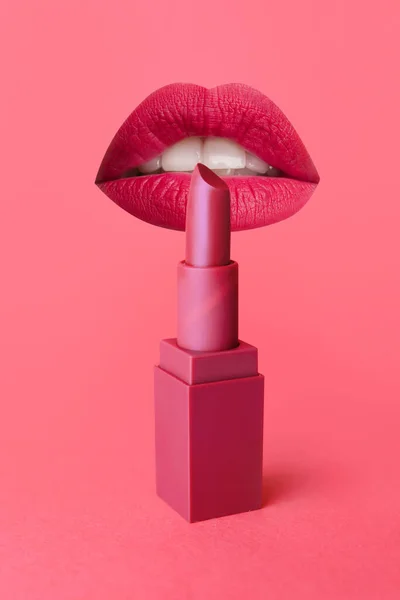Female mouth with pink lipstick on color background