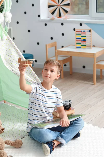 Cute Little Boy Reading Book Playing Home — Stock Photo, Image