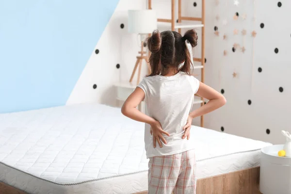 Little Girl Suffering Back Pain Morning Because Uncomfortable Mattress — Stock Photo, Image
