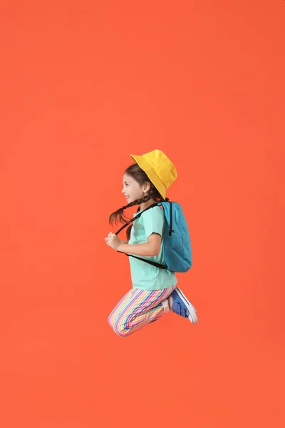 Jumping Little Girl Backpack Color Background — Stock Photo, Image