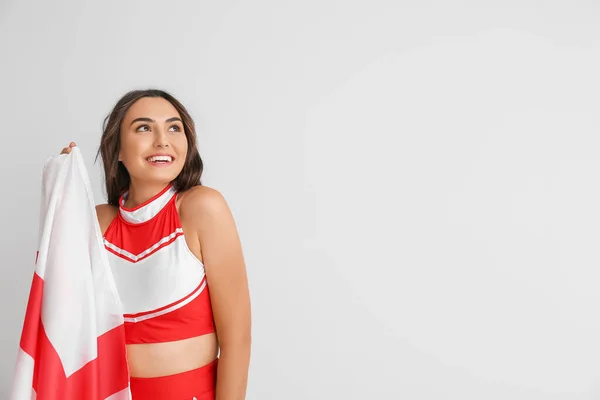 Piękna Cheerleaderka Flagą Anglii Jasnym Tle — Zdjęcie stockowe