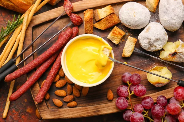 Cheese Fondue Different Snacks Grunge Background — Stock Photo, Image