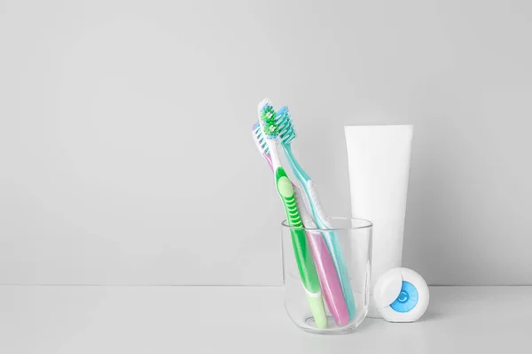 Holder Tooth Brushes Paste Floss White Background — Stock Photo, Image