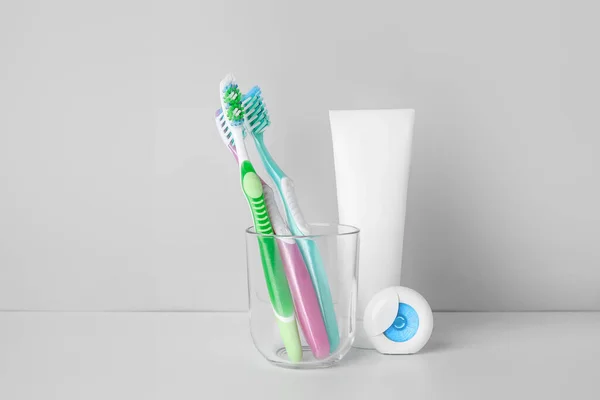 Holder Tooth Brushes Paste Floss White Background — Stock Photo, Image