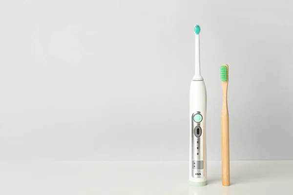 Different Tooth Brushes Light Background — Stock Photo, Image