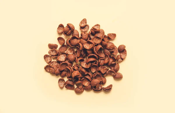 Heap Van Chocolade Cornflakes Kleur Achtergrond — Stockfoto