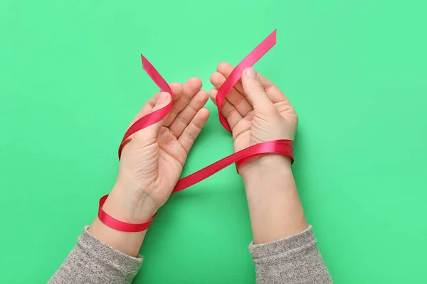 Female Hands Red Ribbon Color Background — Stock Photo, Image
