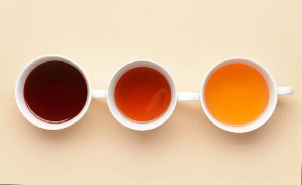 Tasses Avec Différents Types Thé Chaud Sur Fond Couleur — Photo