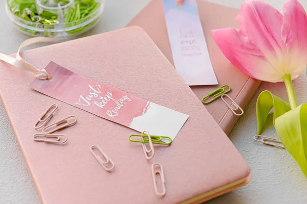 Notebooks Bookmarks Flower Stationery Light Background Closeup — Stock Photo, Image