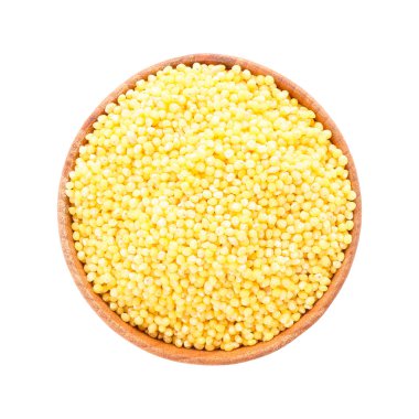 Beyaz arka planda kuru darı ile kase