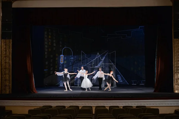 Dancers on stage in ballet theatre