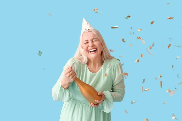 Happy Mature Woman Party Hat Champagne Color Background — Stock Photo, Image