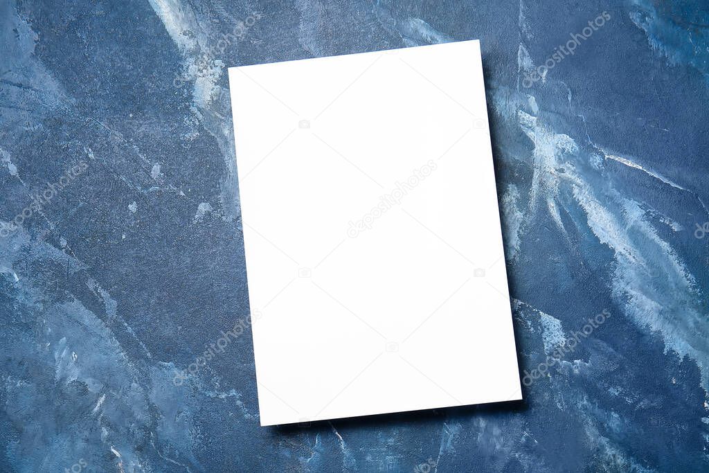 Blank sheet of paper on color background
