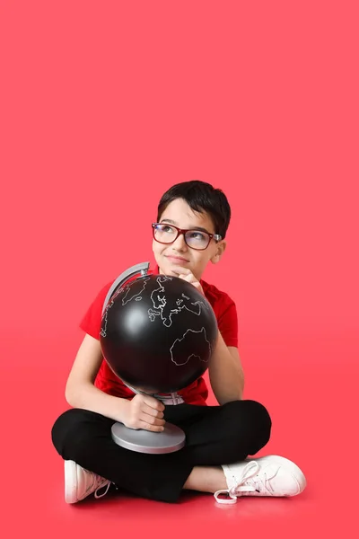 Thoughtful Little Boy Globe Color Background — Stock Photo, Image