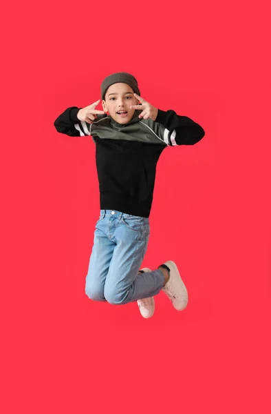 Jumping Little Boy Color Background — Stock Photo, Image