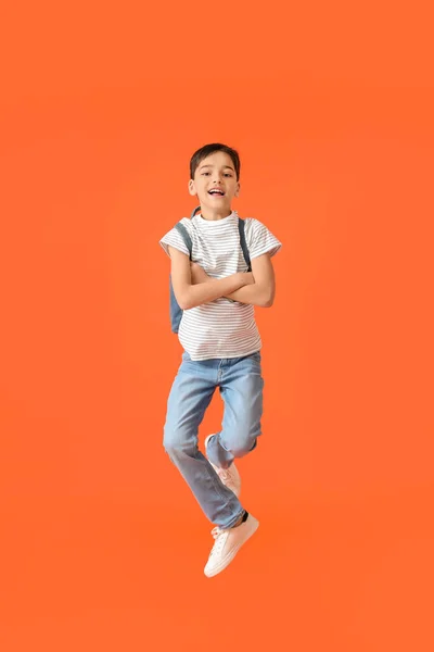 Jumping Little Schoolboy Color Background — Stock Photo, Image