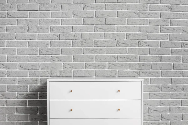 Modern Chest Drawers Brick Background — Stock Photo, Image