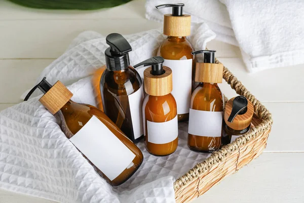 Wicker Basket Bottles Natural Shampoo Light Wooden Background — Stock Photo, Image