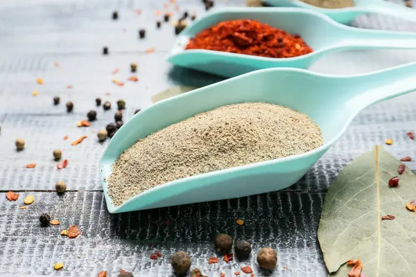 Scoops Different Spices Light Wooden Background Closeup — Stock Photo, Image