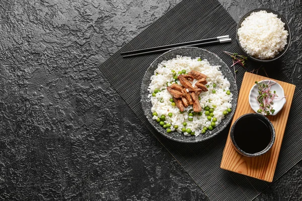 Plate Tasty Rice Green Peas Meat Dark Background — Stock Photo, Image
