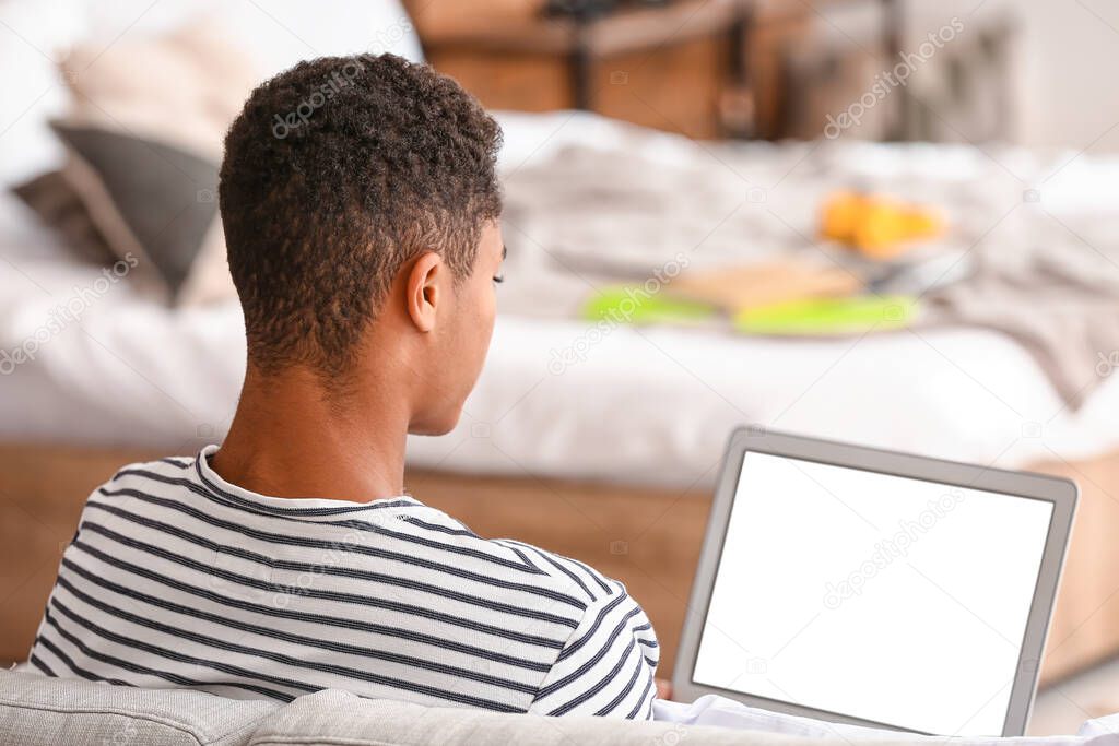 African-American student studying online at home