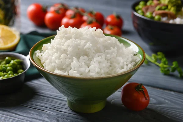 Bowl Tasty Rice Vegetables Dark Wooden Background — Stock Photo, Image