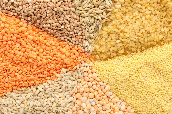 Haufen Verschiedener Getreidesorten Und Hülsenfrüchte Als Hintergrund — Stockfoto