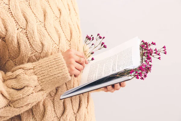 Woman Holding Book Fresh Flowers Light Background Closeup — Stock Photo, Image